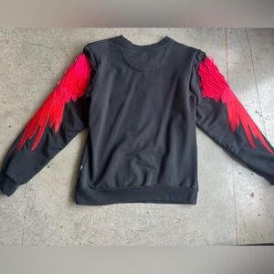 Black sweater with red wings medium